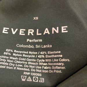 Everlane Perform Bra and matching leggings.